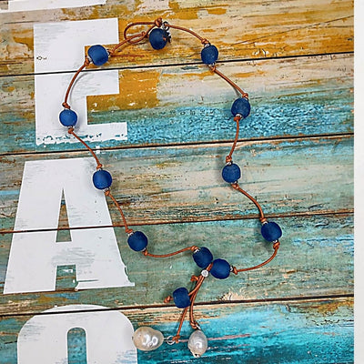 Cobalt Navy Blue Beach Glass Necklace With Pearl Tassel, Beauty In Stone Jewelry at $99