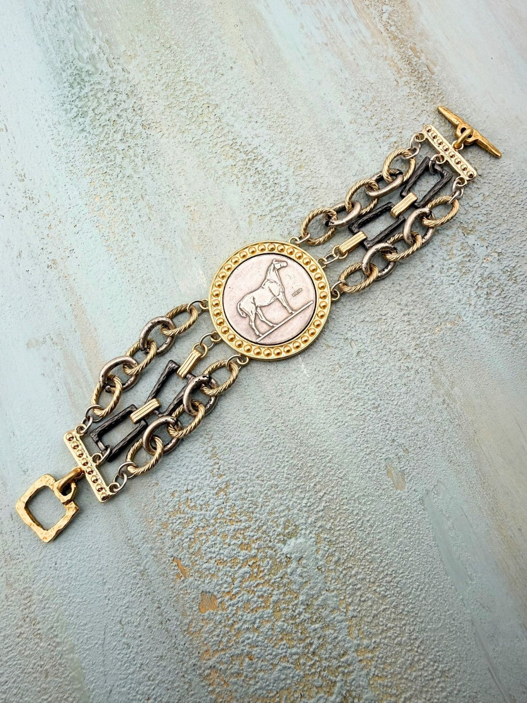 Gilded Spirit – Artisan Mixed-Metal Horse Coin Bracelet