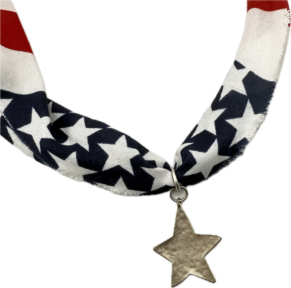 American flag patterned scarf with star pendants.