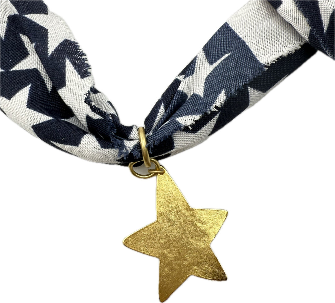 American flag patterned scarf with star pendants.