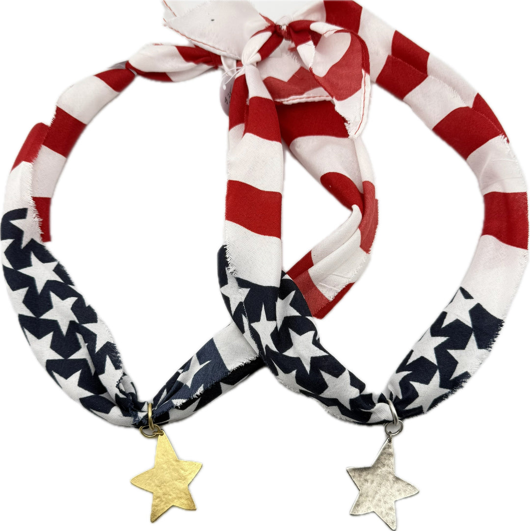 American flag patterned scarf with star pendants.