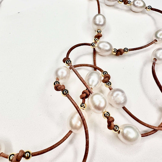 Pearl Lariat With Gold on Leather