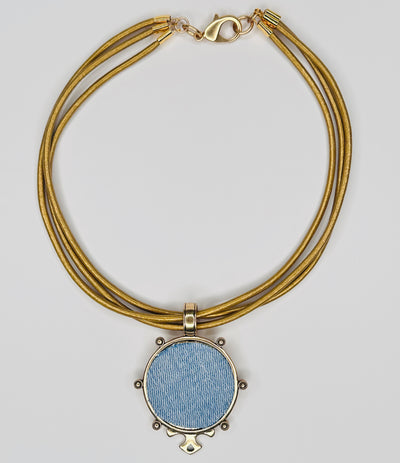 denim necklace on gold leather