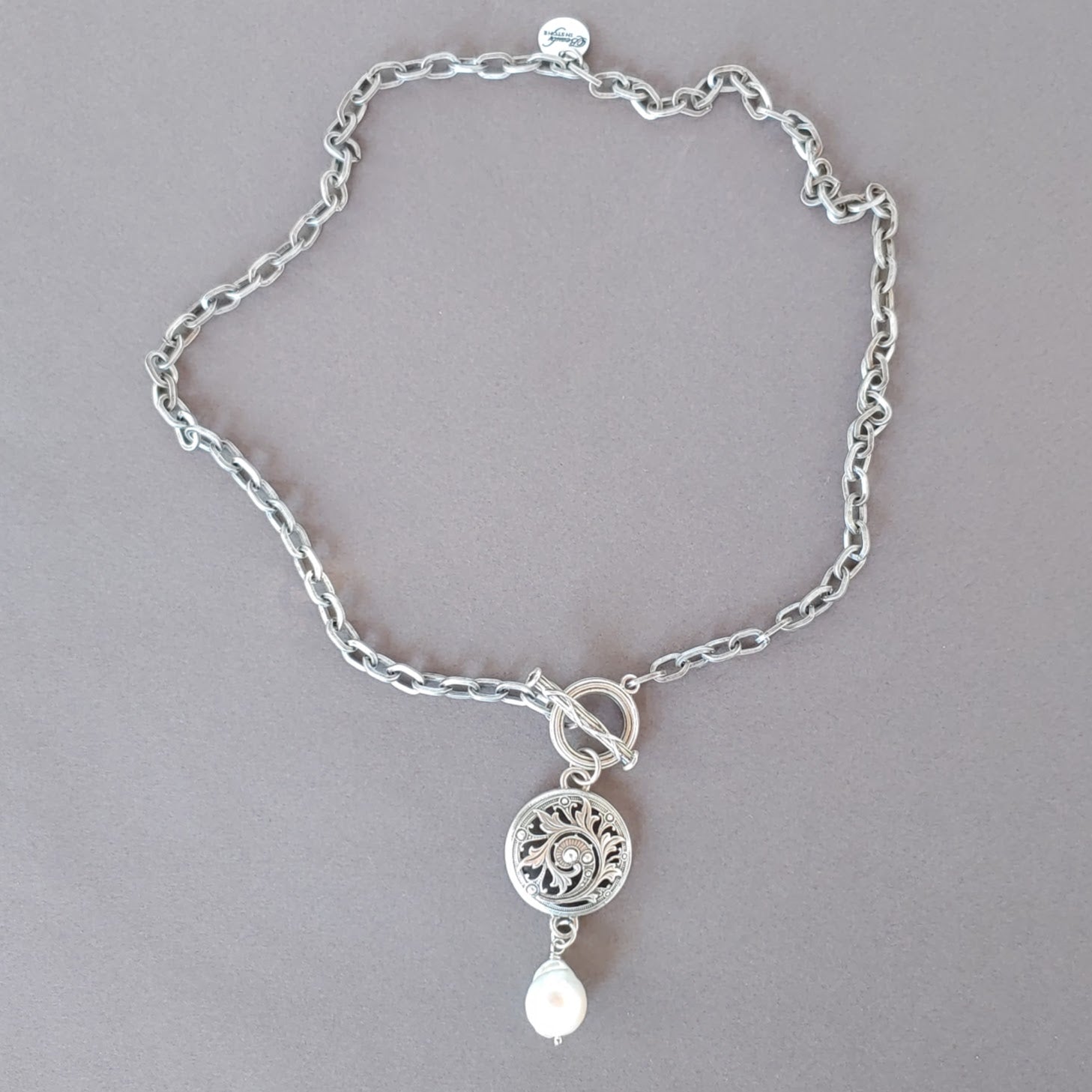 Front Toggle Necklace With Medallion & Pearl Dangle, Beauty In Stone Jewelry at $149