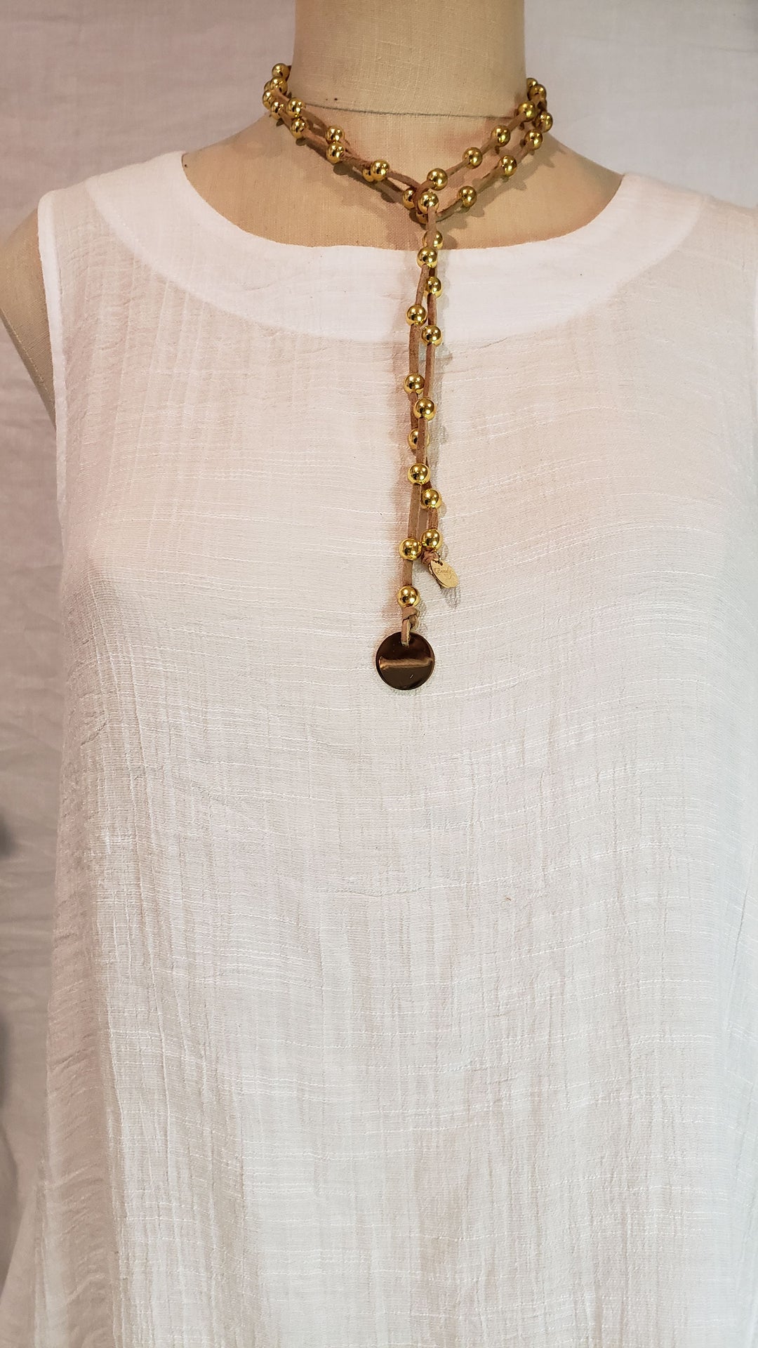 Gold Beaded Lariat Necklace On Suede Leather, Beauty In Stone Jewelry at $80