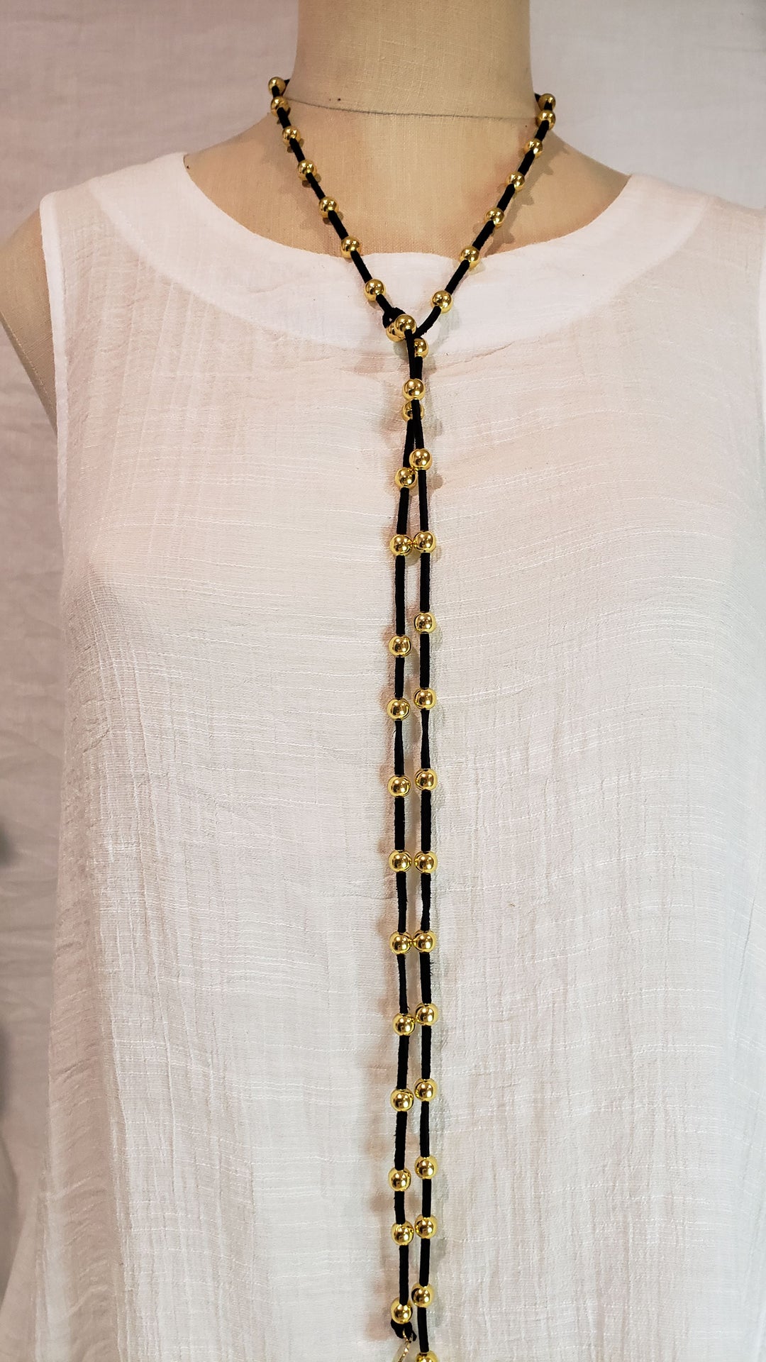 Gold Beaded Lariat Necklace On Suede Leather, Beauty In Stone Jewelry at $80