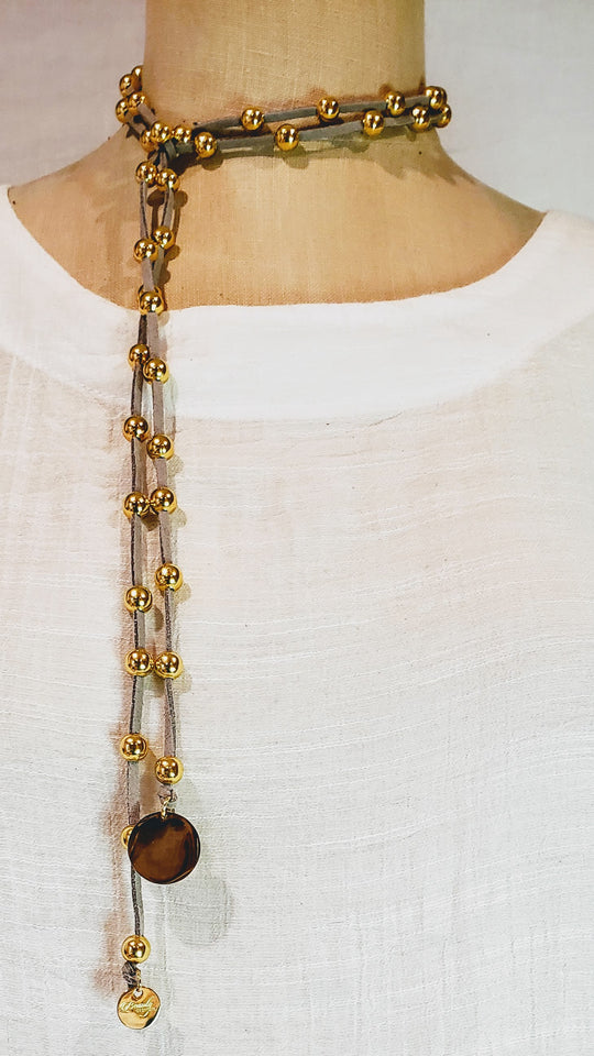 Gold Beaded Lariat Necklace On Suede Leather, Beauty In Stone Jewelry at $80